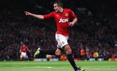 九游体育-赛道与球场，当F1新赛季揭幕战遇上中韩足球对决